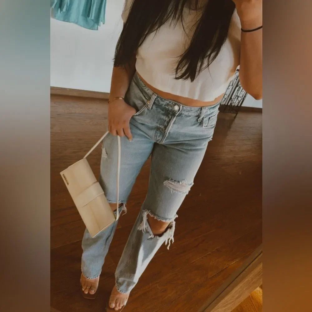 Distressed blue jeans
